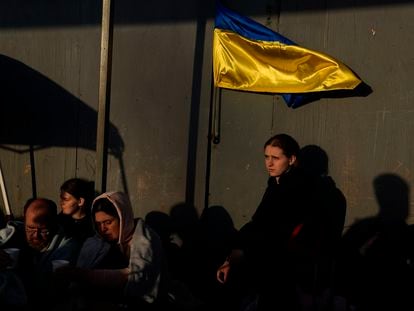 Ukrainian refugees wait near the U.S. border in Tijuana, Mexico, April 4, 2022.