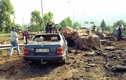 The aftermath of the bombing attack on Judge Giovanni Falcone, his wife and three policemen who were escorting him, on May 23, 1992.