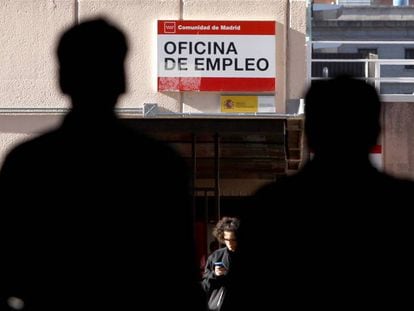 People outside an employment office in Madrid.