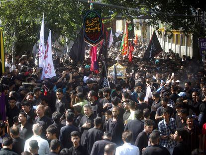 Kashmiri Shiite Muslims take part in a religious procession on the seventh day of Islamic month of Muharram, in Srinagar, the summer capital of Indian Kashmir, 26 July 2023.