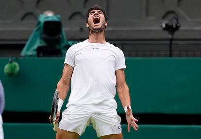 Spain's Carlos Alcaraz celebrates as he wins a point against Italy's Matteo Berrettini in a men's singles match on day eight of the Wimbledon tennis championships in London, Monday, July 10, 2023.