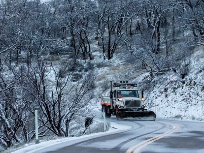 A snow plow works along Mt Hamilton road in Unincorporated Santa Clara County, Calif. Thursday, Feb. 23, 2023.