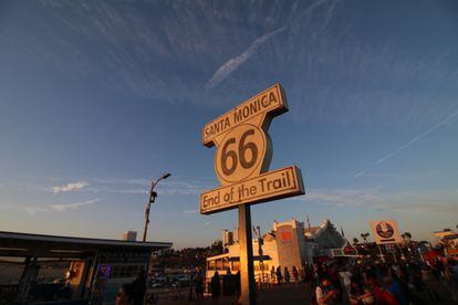 A sign on the pier in Santa Monica, California, indicates the end of Route 66. 
