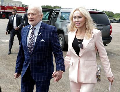 Apollo 11 astronaut Buzz Aldrin, left, and Anca Faur arrive at the Kennedy Space Center for a visit in recognition of the Apollo 11 moon landing anniversary, on July 20, 2019, in Cape Canaveral, Fla.