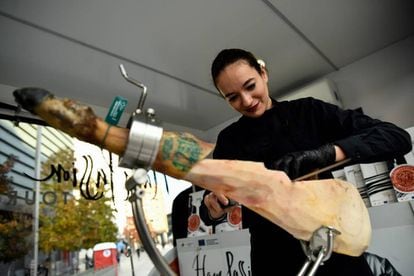 Ham carvers are highly sought after in Spain. Pictured, the specialist Raquel Acosta.