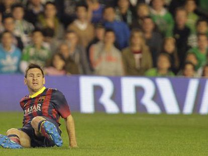 Leo Messi lies prostrate after suffering a hamstring injury on Sunday. 
