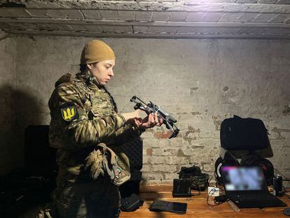 Annya, a Ukrainian soldier, with one of the drones.