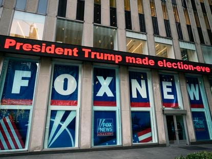 A headline about President Donald Trump is displayed outside Fox News studios in New York