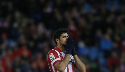 Diego Costa rues a missed chance in a cup match against Valencia. 