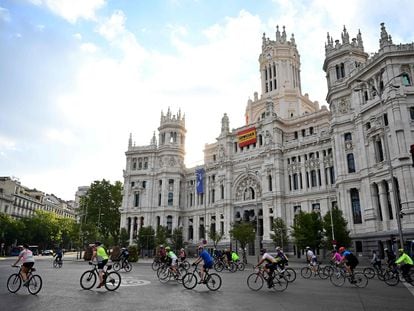 Cyclists ride past Madrid's Cibeles Palace on Saturday.