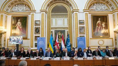 Minister of Justice of Ukraine, Denys Maliuska, fifth left, speaks during the Justice Ministers' conference in London on March 20, 2023, in support of the ICC.