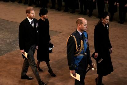 Prince Harry and Meghan Markle walk behind William and Kate Middleton in Westminster Abbey on September 14 during the funeral of their grandmother, Queen Elizabeth II.