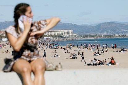 People at Malvarrosa beach in Valencia on March 14.