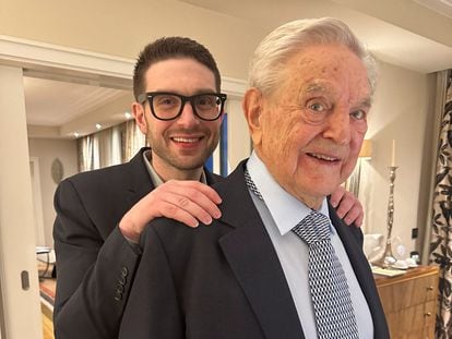 George Soros is seen with his son Alexander, in Munich, Germany in this picture obtained from social media and released February 16, 2023.