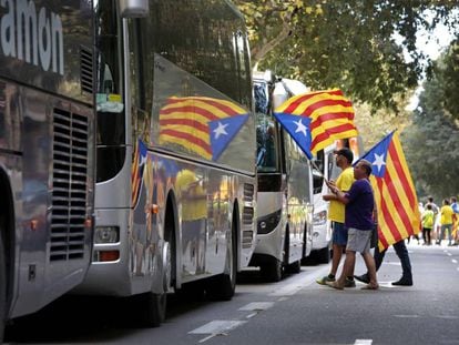 Pro-independence supporters board buses to attend La Diada, or Catalan National Day.