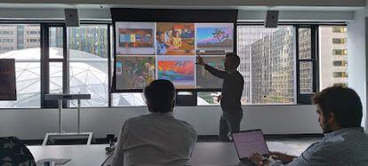 Daniel Rausch, Amazon's vice president for entertainment and services, shows the features of the new TVs at the company's headquarters in Seattle. 