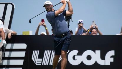 US golfer Dustin Johnson tees off on the 1st tee during the first round of 2023 LIV Golf DC at Trump National Golf Club in Sterling, Virginia, in May 2023.