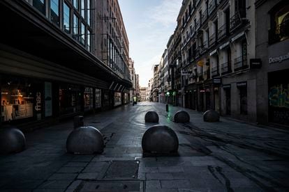 Preciados street in Madrid, normally packed with shoppers and tourists, deserted under the lockdown.