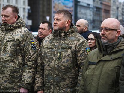 Valerii Zaluzhnyi (center), the commander-in-chief of Ukraine’s armed forces, with Defense Minister Oleksii Reznikov (right), during a memorial ceremony for the military commander Dmytro Kotsiubaylo, known as ‘Da Vinci,’ in Kyiv on 10 March.