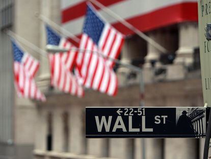 A Wall St. sign next to the New York Stock Exchange (NYSE) September 16, 2008 in New York City.
