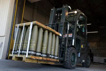 Airmen with the 436th Aerial Port Squadron use a forklift to move 155 mm shells ultimately bound for Ukraine, April 29, 2022, at Dover Air Force Base, Delaware.