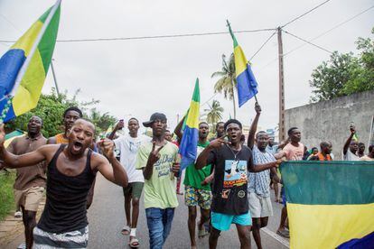 People celebrate in support in a street of Port-Gentil, Gabon, on August 30, 2023.