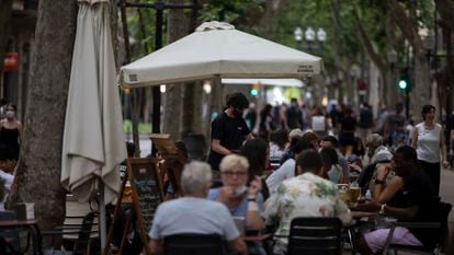 Sidewalk cafés in Rambla del Poblenou in Barcelona.