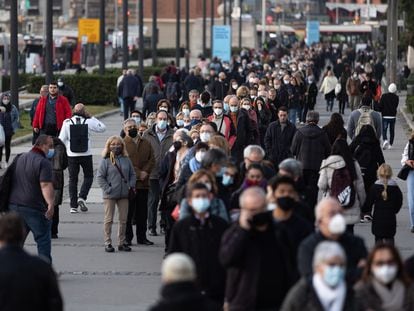 People line up to get vaccinated in Barcelona on Wednesday.
