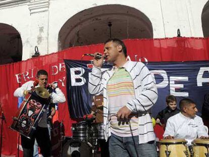 Members of prison rock band formed by 'Vatayón Militante' play at a recent government rally.