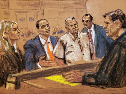 Genaro García Luna, center, depicted during a hearing inside the court, on February 27, 2020.