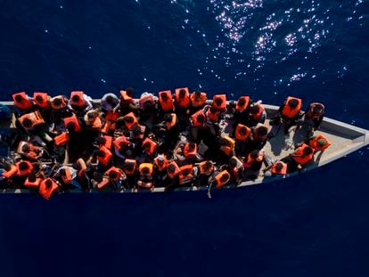Migrants from Eritrea, Libya and Sudan sail a wooden boat before being assisted by aid workers of the Spanish NGO Open Arms, in the Mediterranean Sea, on June 17, 2023.