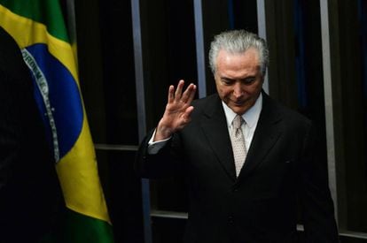 President Michel Temer waves as he takes office on Wednesday.