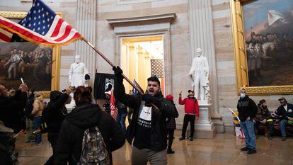 Supporters of US President Donald Trump protesting inside the US Capitol on January 6 after breaching security.