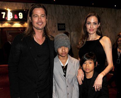 Brad Pitt and Angelina Jolie with two of their children, Maddox Jolie-Pitt and Pax Jolie-Pitt, in London in 2013.