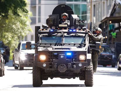 Law enforcement officers arrive near the scene of an active shooter on Wednesday, May 3, 2023 in Atlanta.