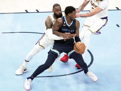 LeBron James (back) of the Los Angeles Lakers contests the ball with Jaren Jackson Jr of the Memphis Grizzlies in the second half of the game between the Los Angeles Lakers and Memphis Grizzlies.