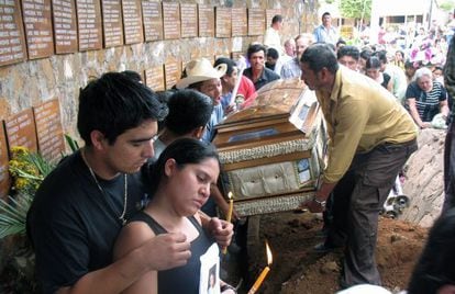 Relatives of Rufina Amaya, the sole survivor of the 1981 El Mozote massacre, carry her coffin after her eventual death in 2007. 