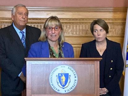 Massachusetts Senate President Karen Spilka, flanked by fellow Democrats, House Speaker Ronald Mariano, left, and Gov. Maura Healey speaks during a news conference. Jan. 22, 2024 in Boston.