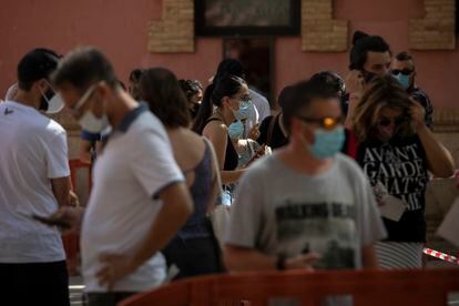 Members of the public wait for coronavirus tests in Villafranca del Panadés, Catalonia.