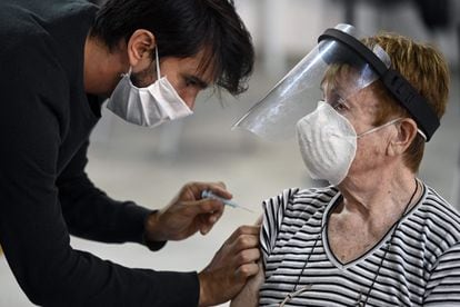 A woman receives the Covid-19 vaccine in Argentina.