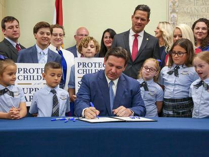 Florida Governor Ron DeSantis signs the Parental Rights in Education bill at Classical Preparatory school on March 28, 2022, in Shady Hills, Florida.