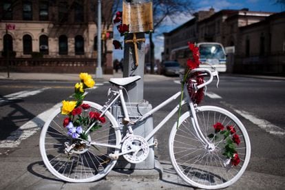 A ghost bike memorial to a cyclist who died in a Brooklyn traffic accident.