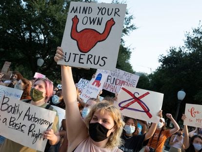 Women of the University of Texas take part in a rally at the Texas Capitol to protest against Governor Greg Abbott's signing of the nation's strictest abortion law that makes it a crime to abort a fetus after six weeks, or when a "heartbeat" is detected.