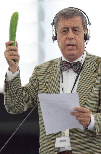 Spanish MEP Francisco Sosa Wagner brandishes a cucumber during Tuesday's debate over the E. coli outbreak.
