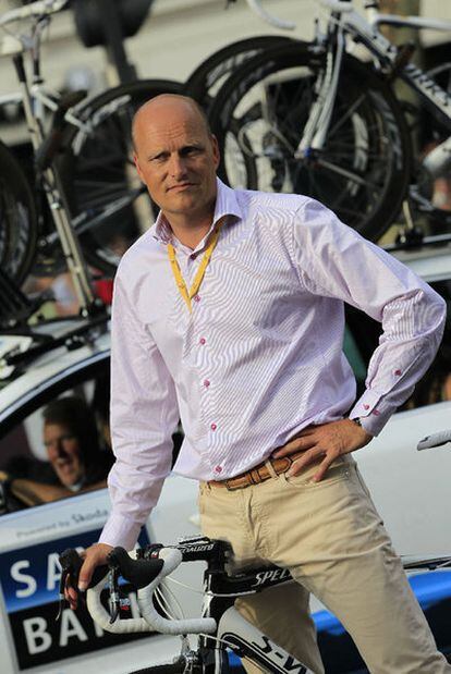 Bjarne Riis pictured in front of the Saxo Bank support car.