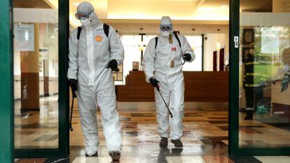 Members of the Emergency Military Unit disinfecting a senior residence in Madrid in March.