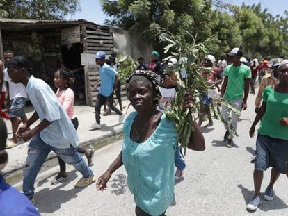 People march to demand the freedom of New Hampshire nurse Alix Dorsainvil and her daughter, who have been reported kidnapped, in the Cite Soleil neighborhood of Port-au-Prince, Haiti, Monday, July 31, 2023.