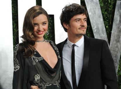 Orlando Bloom with then-partner Miranda Kerr at the 2013 Vanity Fair Oscar party in West Hollywood, California. 