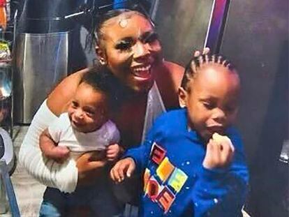 In this photo released by the Young Family via their family attorney,  Ta'Kiya Young is pictured with her sons, Ja'Kobie, right, and Ja'Kenlie, left, in an undated photo. Young was shot and killed on Aug. 24, 2023, by Blendon Township police outside an Ohio supermarket. The 21-year-old was pregnant and due to give birth in November, according to her family