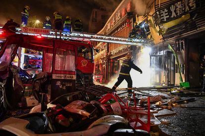 Firefighters work at the site of an explosion at a restaurant in Yinchuan, northwest China's Ningxia Hui Autonomous Region, on June 21, 2023.